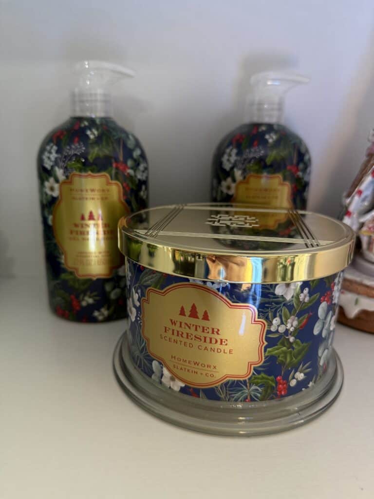 Holiday scented candle with winter fireside design, perfect for cozy winter evenings.