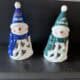 Decorative NFL football team gnome figurines, Buffalo Bills and Philadelphia Eagles holiday décor.