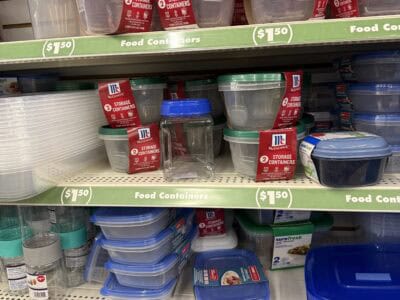 Food storage containers on store shelves for kitchen organization and meal prep.