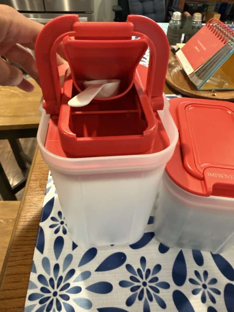 Pantry Organization Ideas That Actually Work in a Real Farmhouse Kitchen 1 Red ice cream maker with scoop on kitchen table for homemade ice cream.