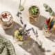 Creative mason jar teacher gifts with flowers and supplies.