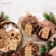 Assorted homemade Christmas food gifts with cookies, fudge, and nuts on a holiday table.